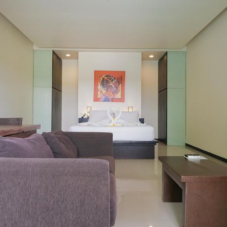 Aparthotel Swiss-Belcourt Sunset à Seminyak Extérieur photo